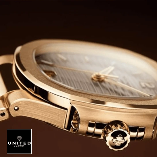 Patek Philippe Nautilus Ladies Rose Replica 5 Patek Philippe Nautlus Ladies Golden Rose Replica side view crown on the logo